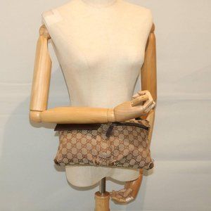 Gucci Tan Monogram Wristlet Clutch